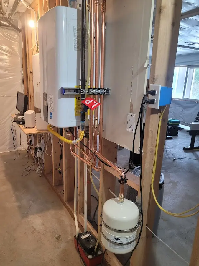 Licensed plumber repairing a kitchen sink in Seminole